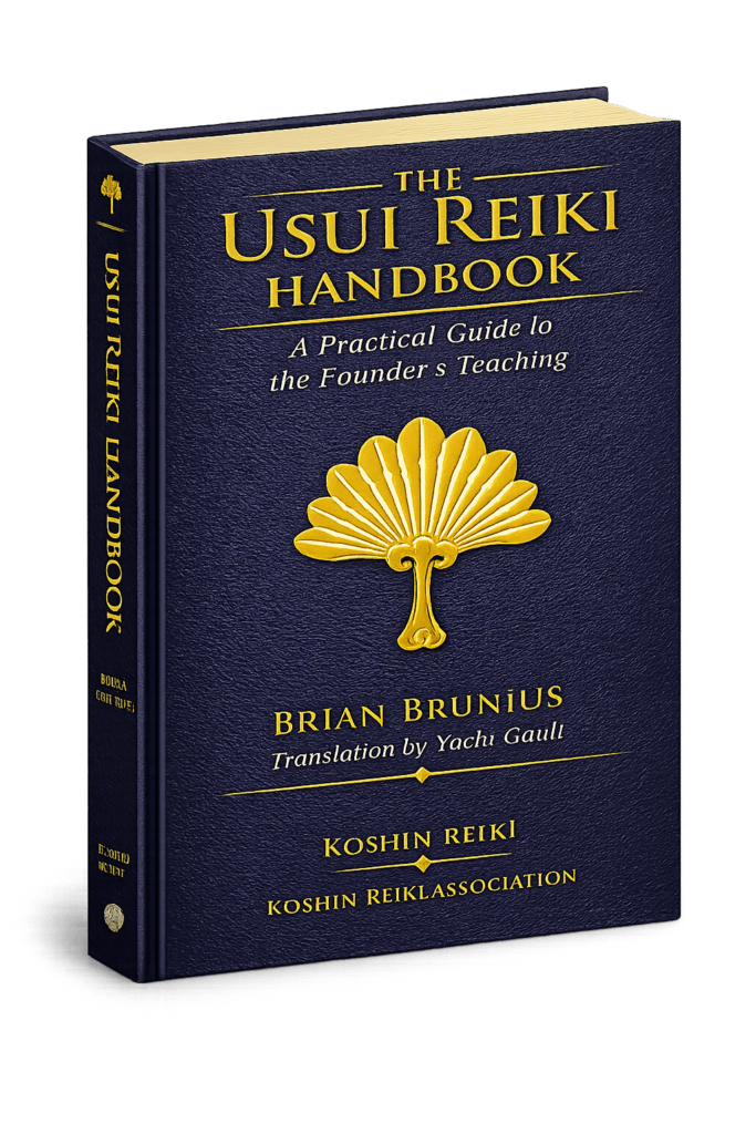 Blue and gold cover of the book, The Usui Reiki Handbook: A Practical Guide to the Founder's Teachings, published by Brian Brunius and the Koshin Reiki Association.